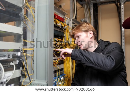 The network technician is working on the telecom site