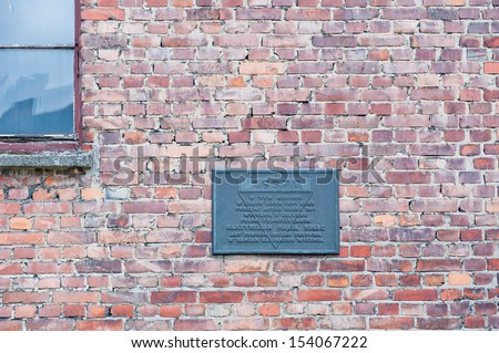 OSWIECIM, POLAND - August 27 2013  Plaque commemorating of Saint Maximilian Maria Kolbe in german Concentration Camp in Auschwitz  August 27, 2013 in Oswiecim - Poland