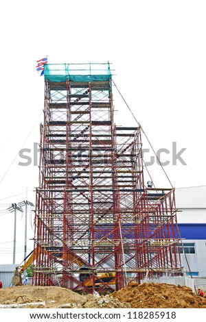 Temporary scaffold for construction works at building site.