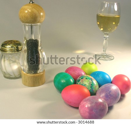 Easter eggs, ingredients and wine. Easter painted eggs, salt, black pepper and wine.