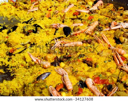 spanish paella with sea reptiles and shrimps, at fair in Barcelona, Spain