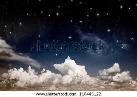Abstract fantasy night sky with clouds and shining stars textured watercolor paper