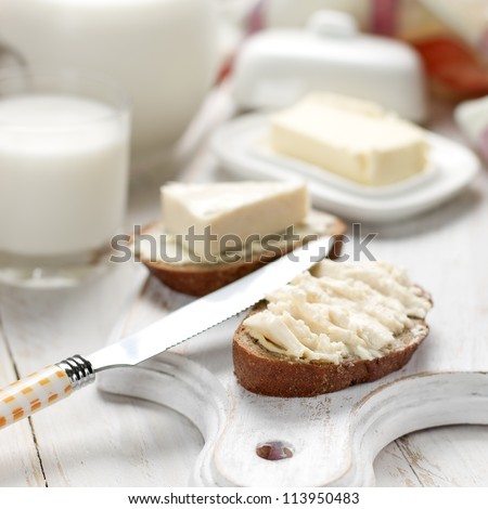 Slice of bread with cream cheese for breakfast