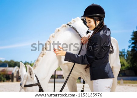 Similar – Image, Stock Photo Stylish sportsman near female partner on city street