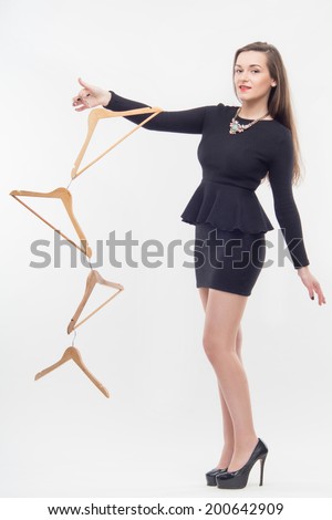 Full length portrait of great sexy woman, showing us the non-standard figure of racks. Isolated on white background