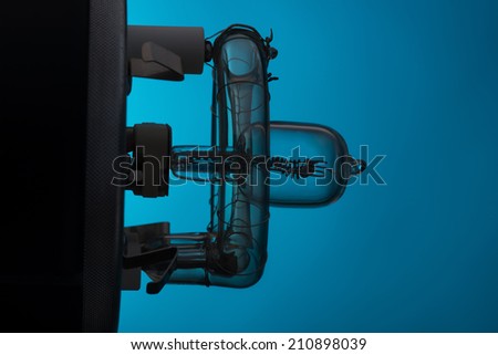 The internal structure of turned on spotlight side view. Isolated on blue background