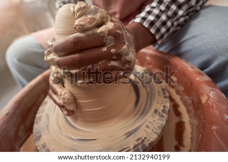 Similar – Image, Stock Photo Crop male ceramist creating cup