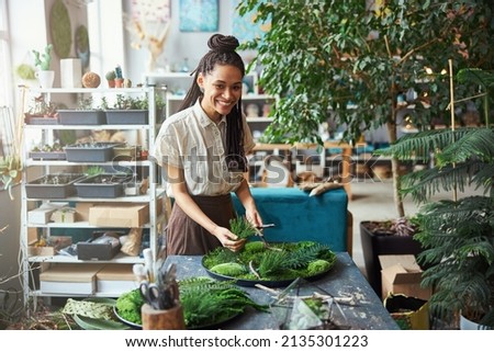 Similar – Image, Stock Photo Female designer creating floral bouquets in studio