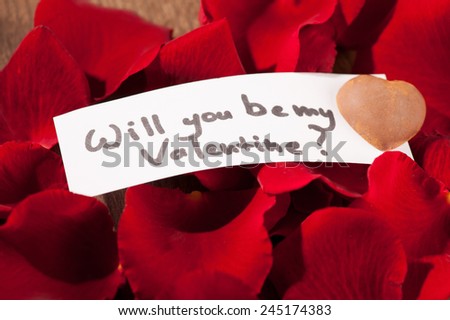 Valentines day. Close up image of be my valentine message placed with copy space on wooden background