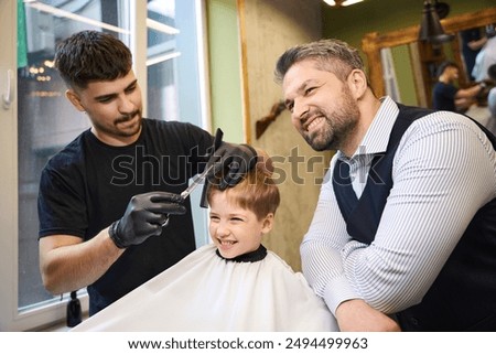 Similar – Image, Stock Photo Father making haircut for son at home