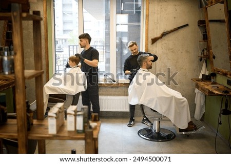 Similar – Image, Stock Photo Father making haircut for son at home