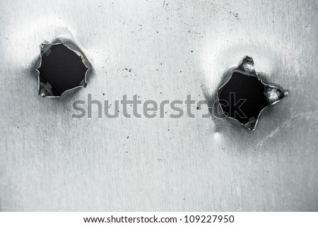 bullet hole in sheet metal