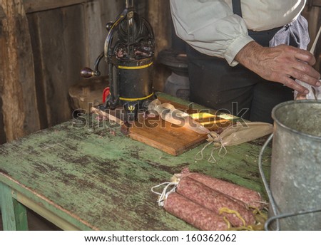 Making Sausage with vintage sausage press