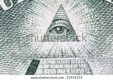 Macro of one dollar bill seeing eye
