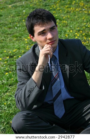 Young Businessman worried or thinking.