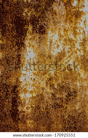 old sheet metal covered with rust and damaged paint