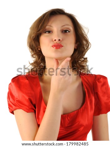 The girl sends an air kiss. Portrait of beautiful girl isolated on white background.