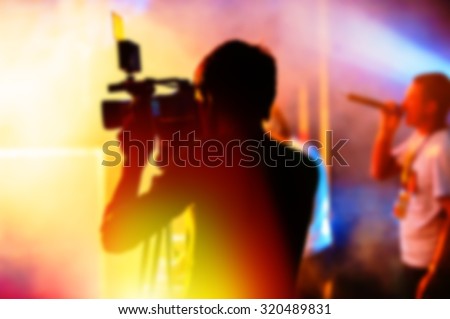 Blurred Background, Cameraman is Videotaping the Concert.  Сток-фото © 