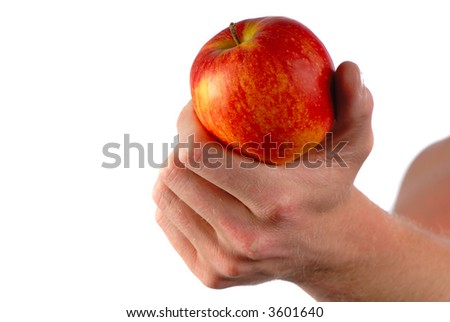 big red apple in  man\'s hand on  white background