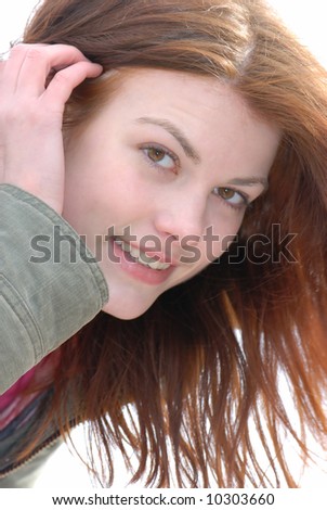 Portrait of  young girl in natural conditions,  close up