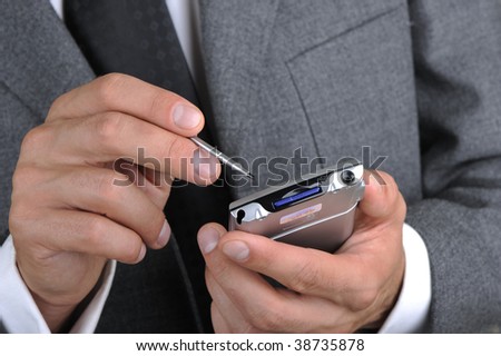 businessman works as a portable computer, hands a closeup