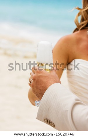 Wedding celebration with champagne on the beach