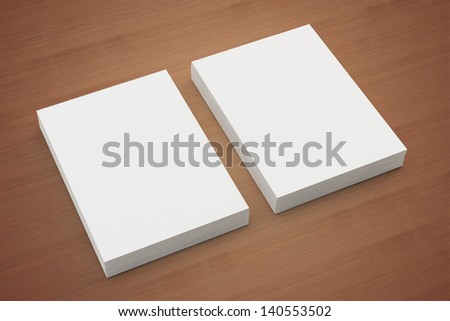 A4 Blank paper stack on wooden background