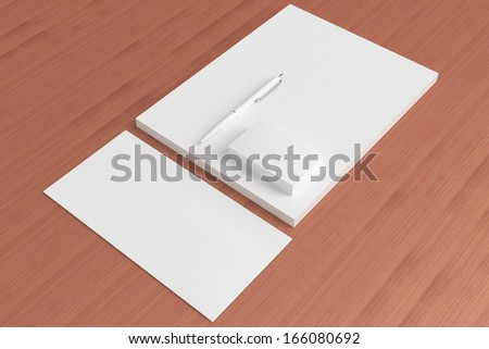 Blank Stationery ID Set on wooden background. Consist of Business cards, pen, letterhead and envelope.