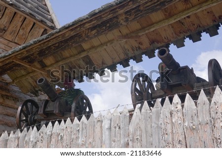 View on cannons at the wall of Russian folk-tales wooden castle