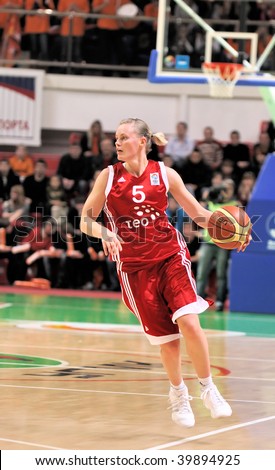 YEKATERINBURG, RUSSIA - OCT 28: Number 5, Milda Sauliute (TEO) takes the ball during the Euroleague 2009 Women\'s basketball game against UMMC held in Yekaterinburg, Russia on Oct. 28, 2009. UMMC beat TEO, 85 to 56.