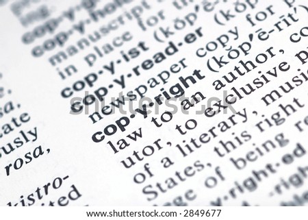 The word copyright from the dictionary showing a shallow depth of field