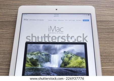 CHIANG MAI, THAILAND - OCTOBER 21, 2014: Apple Computers website with the newly launched Apple iMac with retina 5K display seen on Apple iPad Air.