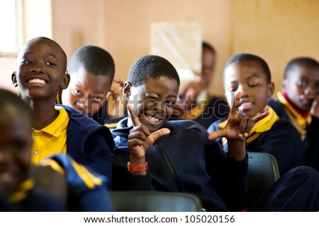 PIGGS PEAK, SWAZILAND-JULY 29: Unidentified orphan schoolboys on July 29, 2008 in Nazarene Mission School, Piggs Peak, Swaziland. Close to 10% of Swazilands population are orphans, due to HIV/AIDS.