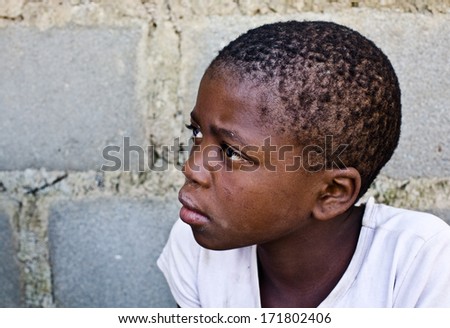 MBABANE, SWAZILAND- JULY 30: Portrait of unidentified Swazi girl on July 30, 2008 in Mbabane, Swaziland. Close to 10 percent of SwazilandÃ¢Â?Â?s total population are orphans, due to HIV/AIDS.