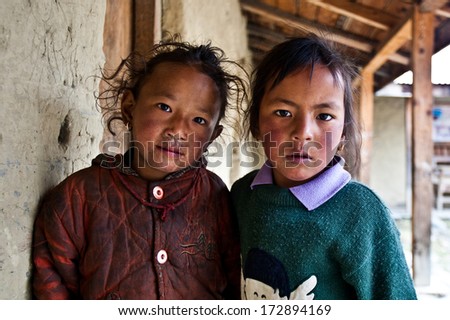PISANG, NEPAL - NOVEMBER 4: Unidentified Tibetan girls in a local school on the famous Annapurna trail on November 4, 2008, in Pisang village Nepal. The majority of the local population are Tibetans.