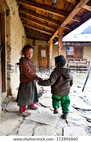 PISANG, NEPAL - NOV 4: Unidentified Tibetan children in a local school on the famous Annapurna trail on November 4, 2008, in Pisang village Nepal. The majority of the local population are Tibetans.