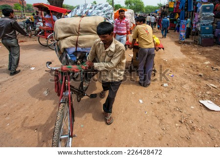 DELHI - APR 16: Unidentified Indian people on April 16, 2011 in Delhi, India. Delhi is the largest urban agglomeration in India by population. It is also the 4th most populous city on the planet.