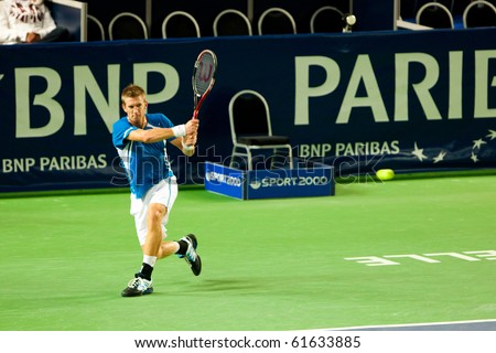 METZ, FRANCE - SEPTEMBER 23: Jarkko Nieminen (Finland, ATP No. 62) defeats Kristof Vliegen (Belgium, not pictured) in the 1/8 finals of the ATP Open de Moselle on September 23, 2010 in Metz.