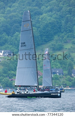 LAKE TRAUNSEE, AUSTRIA - MAY 15: TEAM AQUA team from Great Britain take the second place at the 2011 RC44 Austria Sailing Cup.RC44 on May 15, 2011 on Lake Traunsee, Austria.