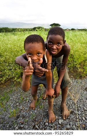 MANZINI, SWAZILAND-DEC 27: Portrait of unidentified Swazi boys on Dec 27, 2007 in a small village near Manzini, Swaziland.  Close to 10% of Swaziland’s total population are orphans, due to HIV/AIDS.