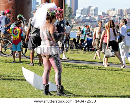 SEATTLE, WA - JUNE 23: People celebrate summer solstice at the annual Fremont Summer Solstice Day festival on June 23, 2013 in Seattle.
