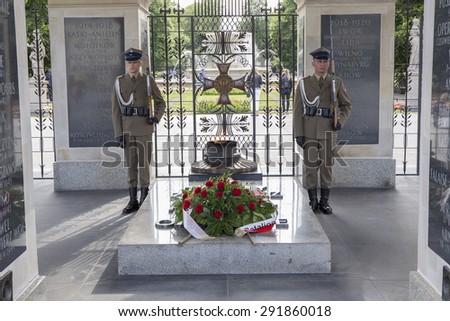 WARSAW, POLAND - JUNE, 20: The Tomb of the Unknown Soldier at Pilsudski Square, on June 20, 2015. Tomb of the Unknown with eternal flame, since 1925.