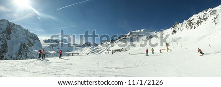 Winter ski panorama in the Alps. Skiers and slopes in SÃ?Â¶lden, Austria