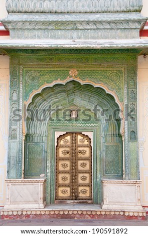 green door of the city palace chandra mahal in india - rajasthan - jaipur