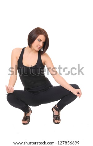 girl in a black shirt and leggings