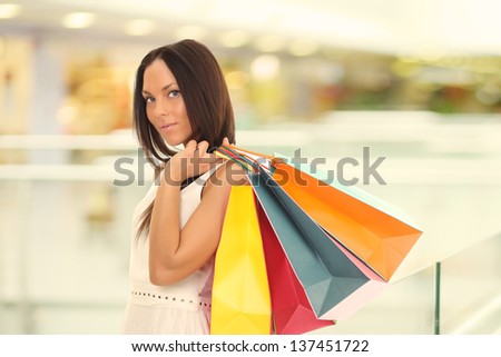 Shopping young woman with bags