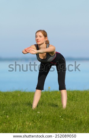 athletic girl, gymnastics at the sea
