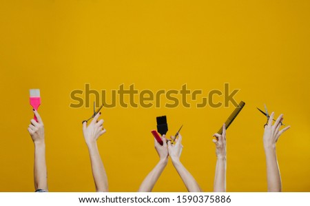 Similar – Image, Stock Photo Hairdresser tools over a many color and natural wigs