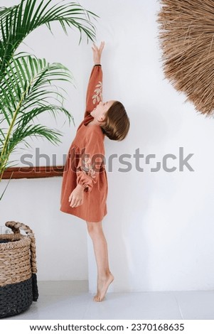 Similar – Image, Stock Photo Playful girl standing in pier near lake