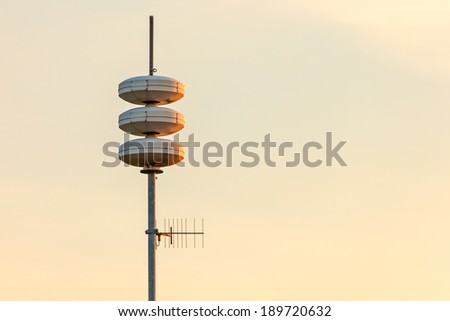Mobile telephone broadcast tower in The Netherlands during sunset